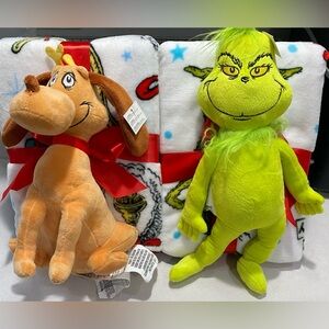 2 grinch blankets with stuffed toys